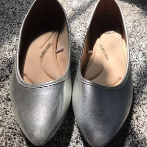 Flat silver shoes